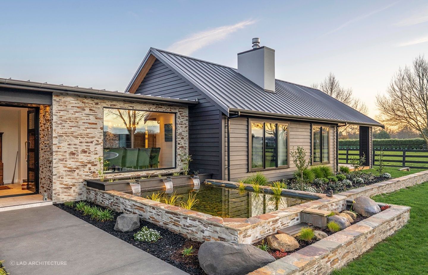 The garden water feature is a delightful addition to the outdoor space. | Photography: Locus Creative