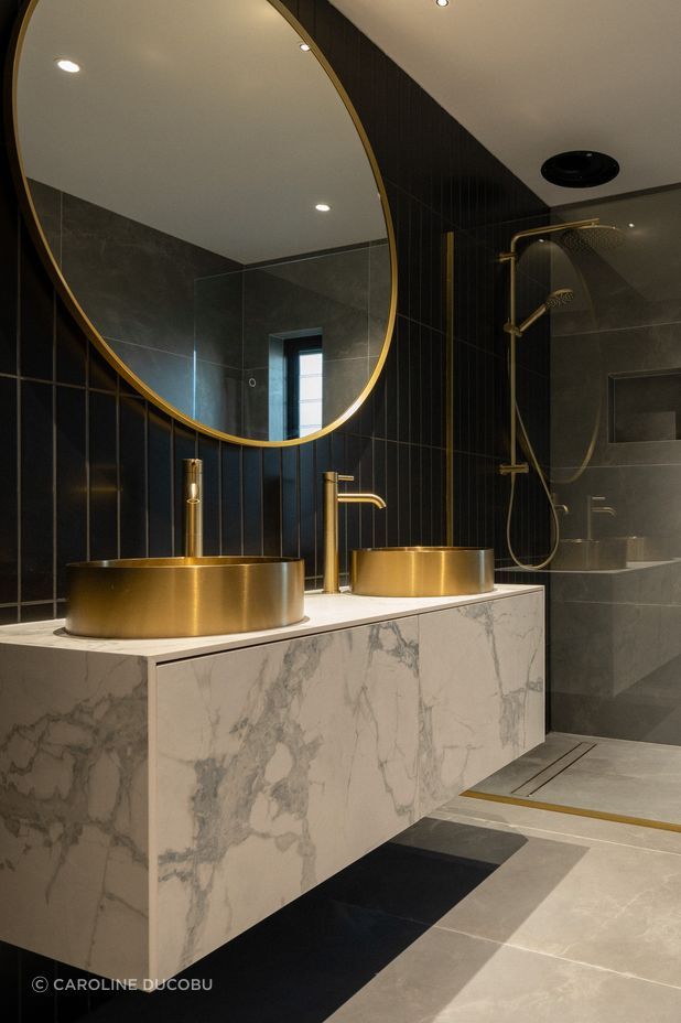 The brass basins and tapware from Elite Bathroomware add wow factor.