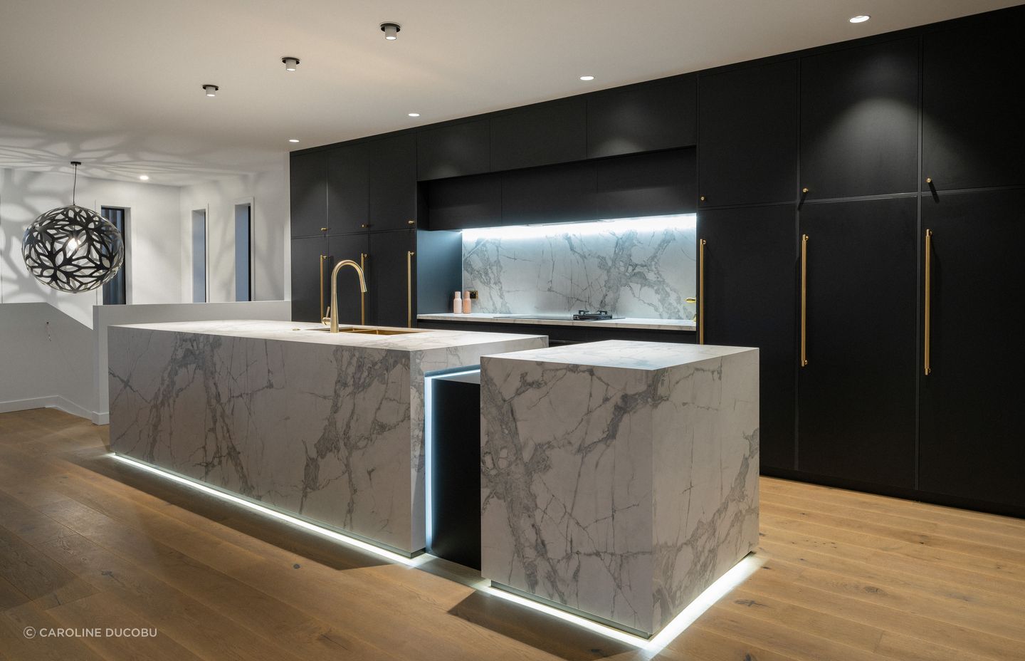 The kitchen is the heart of the home with showstopping architectural features.