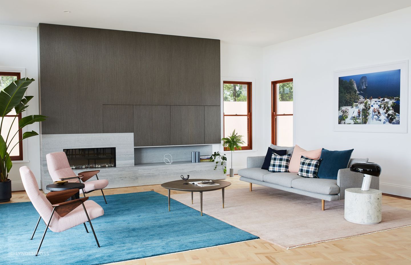 The fireplace is an important new addition to the cosy lounge space.