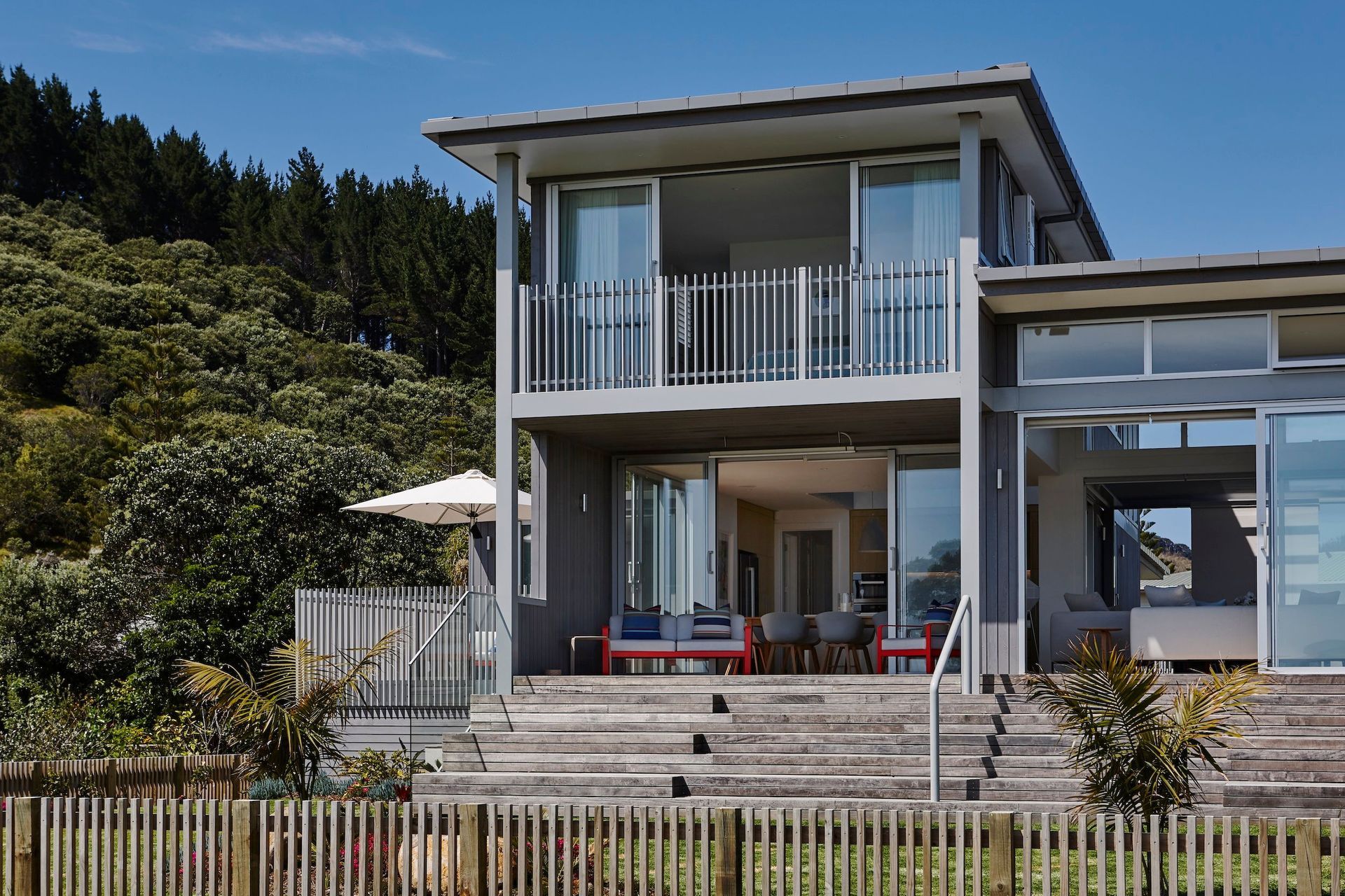The four-bedroom three-bathroom holiday home by Kate Rogan and Eva Nash of Rogan Nash Architects. “We wanted to make sure it really opened up and was welcoming to the beach and any passers by,” says Kate, “and you could walk from the house to the beach and back again.”