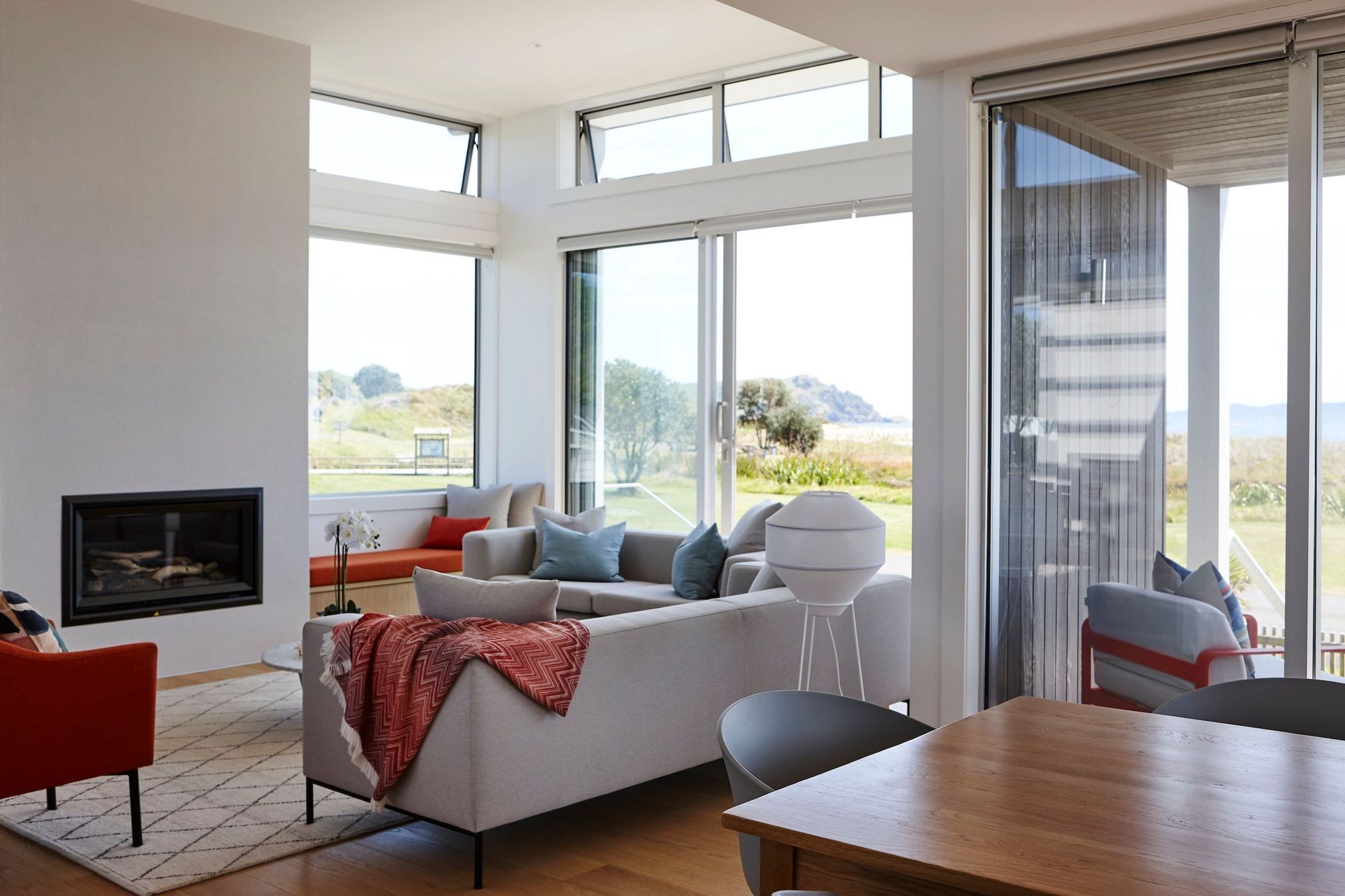 The client’s favourite colours are red and orange, says Eva. “So we wanted to bring that into the house and have it be a place they really treasured.” The outdoor furniture is from Jardin.