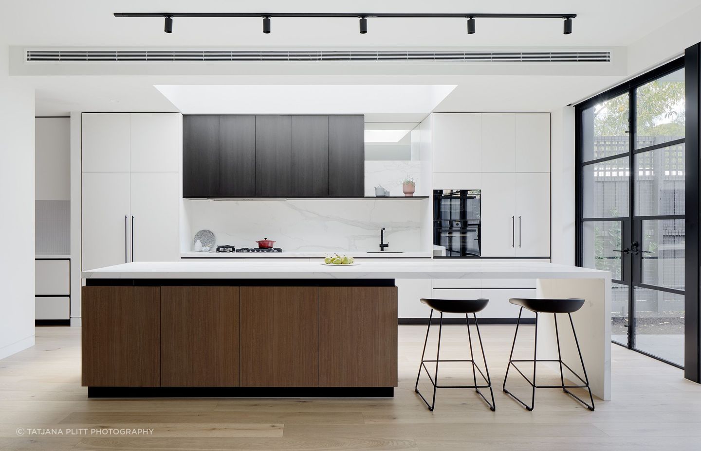 "The kitchen was really important; it was probably the most important room in the house for the client. They wanted it to be generous, light-filled, have lots of storage, and be a robust, working kitchen because they love to cook."