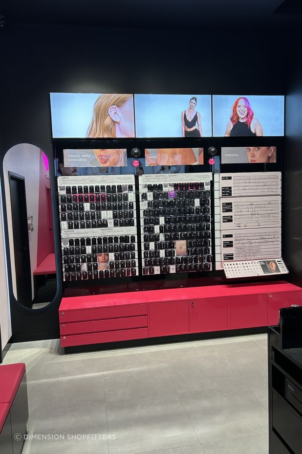 The store's glossy interior features built-in display and storage cabinetry.