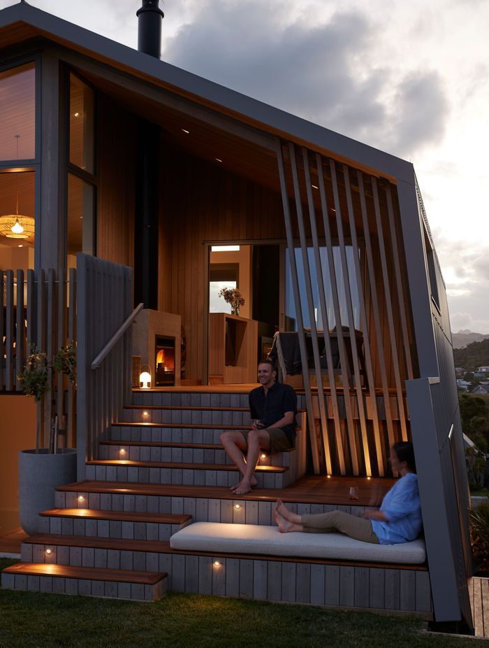 The eastern elevation, providing access to the ground floor's rumpus room and the upper floor's outdoor lounge. | Photographer: Jackie Meiring