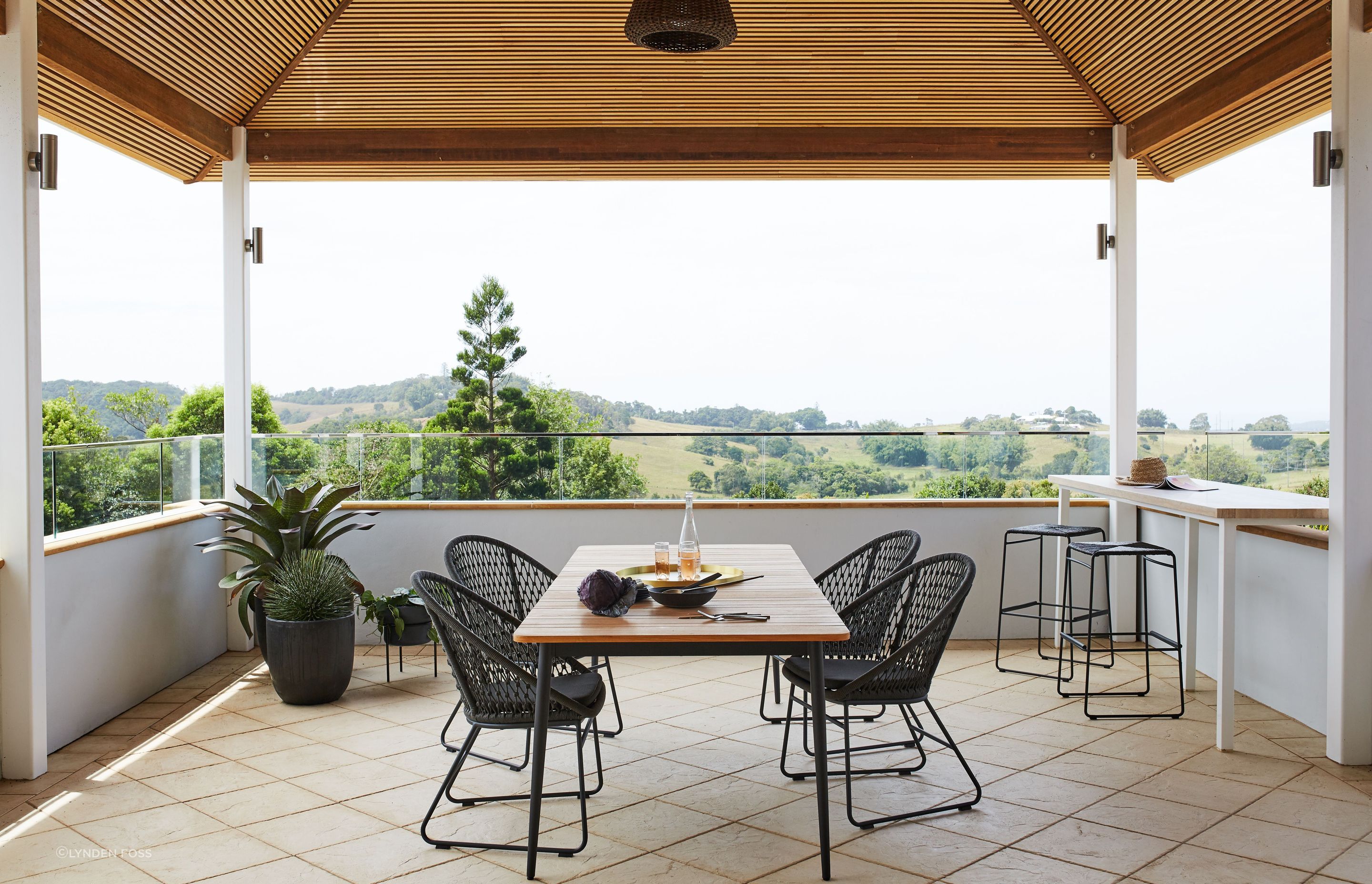 The outdoor living space was reinvigorated with new tiles and ceiling cladding.