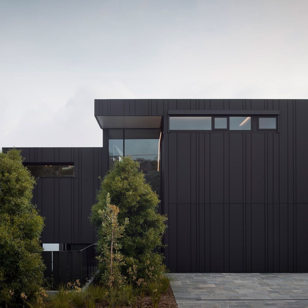 A minimalist coastal retreat with a stunning facade