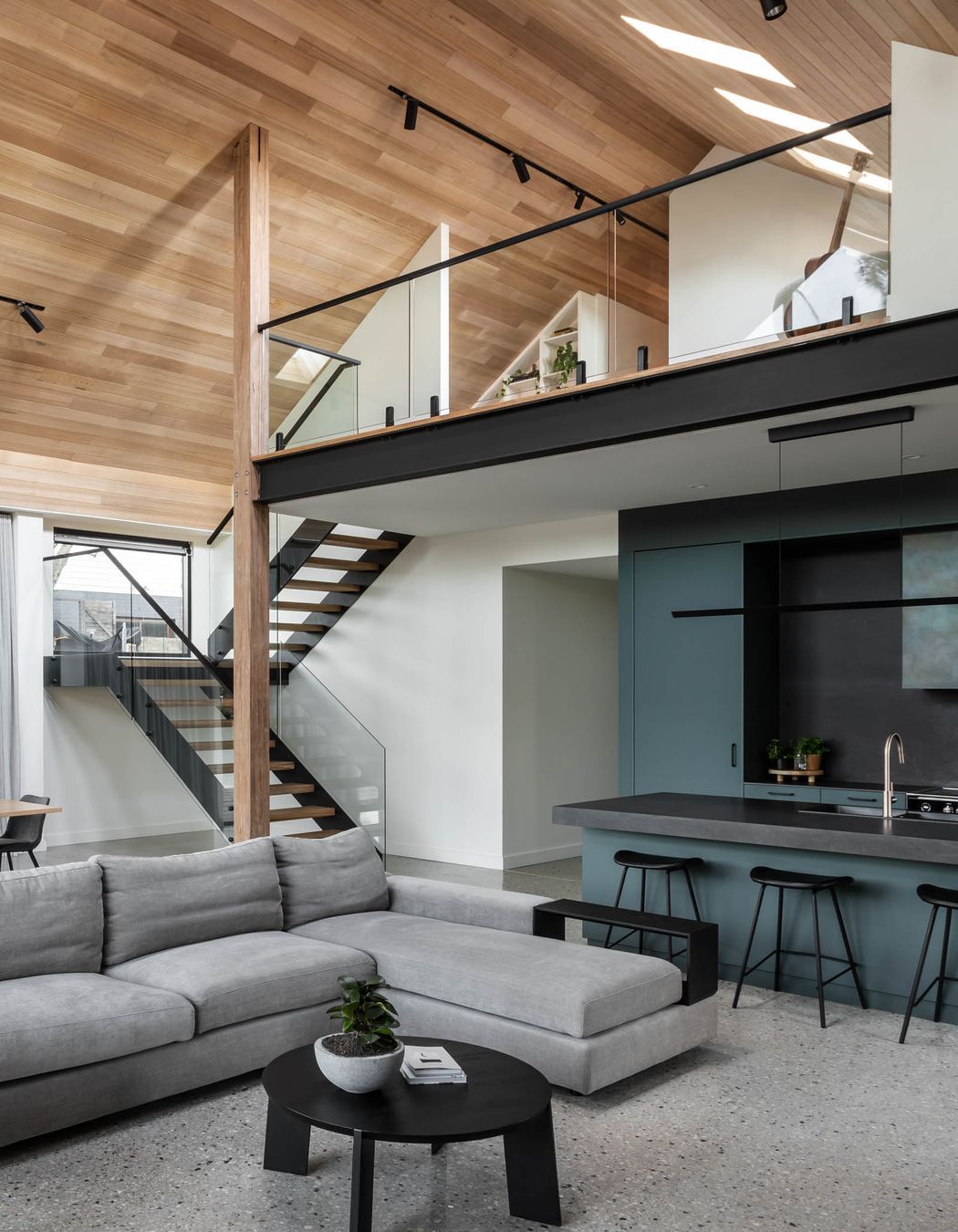 Tasmanian wood lines the raked ceilings.