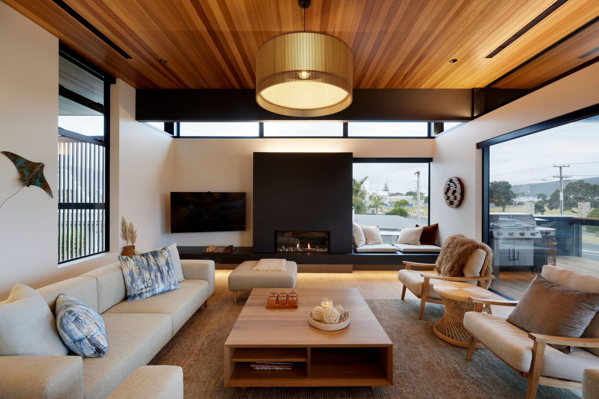 Brendon has included several cosy nooks such as the built-in seating next to the fire. “They’re nicely scaled and nicely positioned. They’re sunny, warm, interesting spaces to be.”