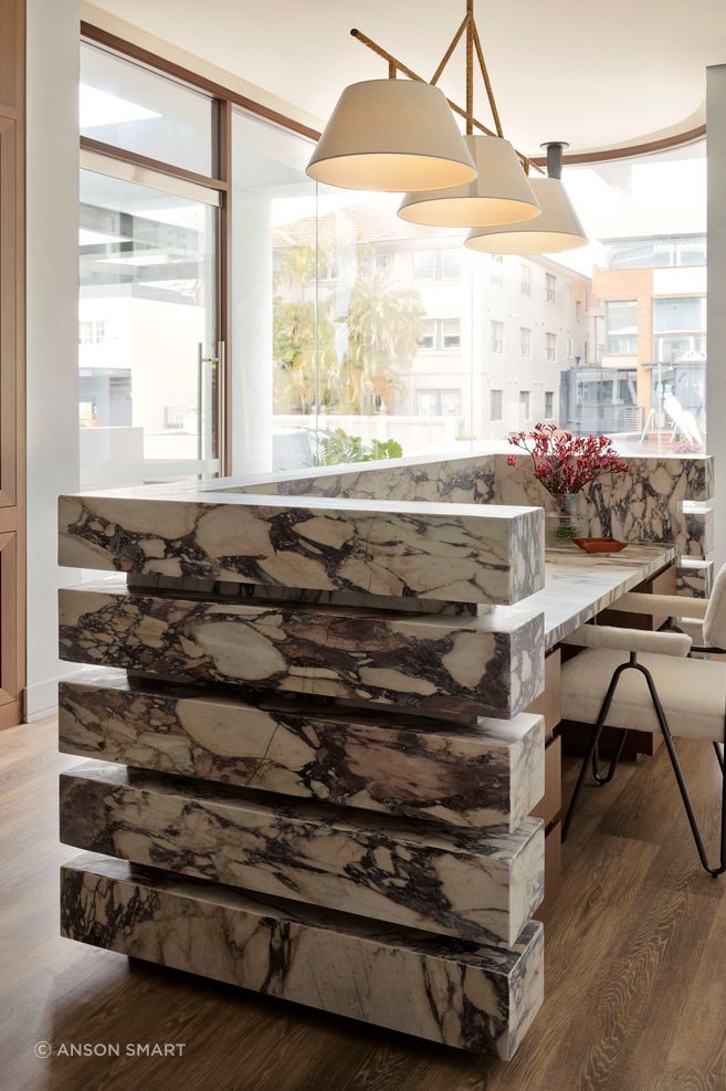 Despite the small footprint, the Ray White showroom feels expansive and luxurious.