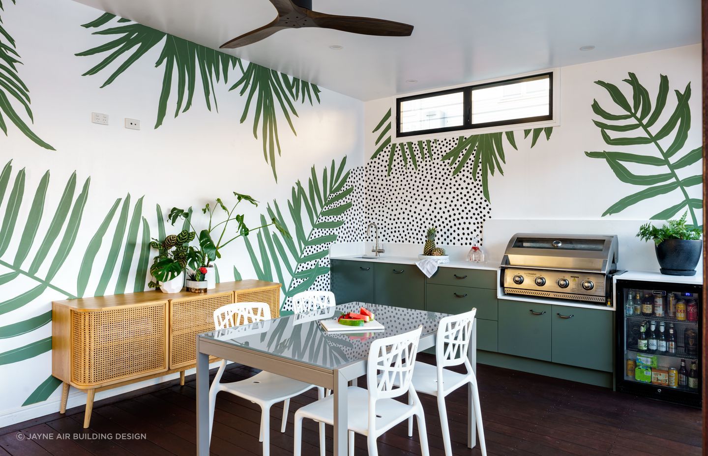 An outdoor sink, like the one featured in this exquisite Tarragindi outdoor kitchen, makes food preparation, cooking and cleaning so much easier