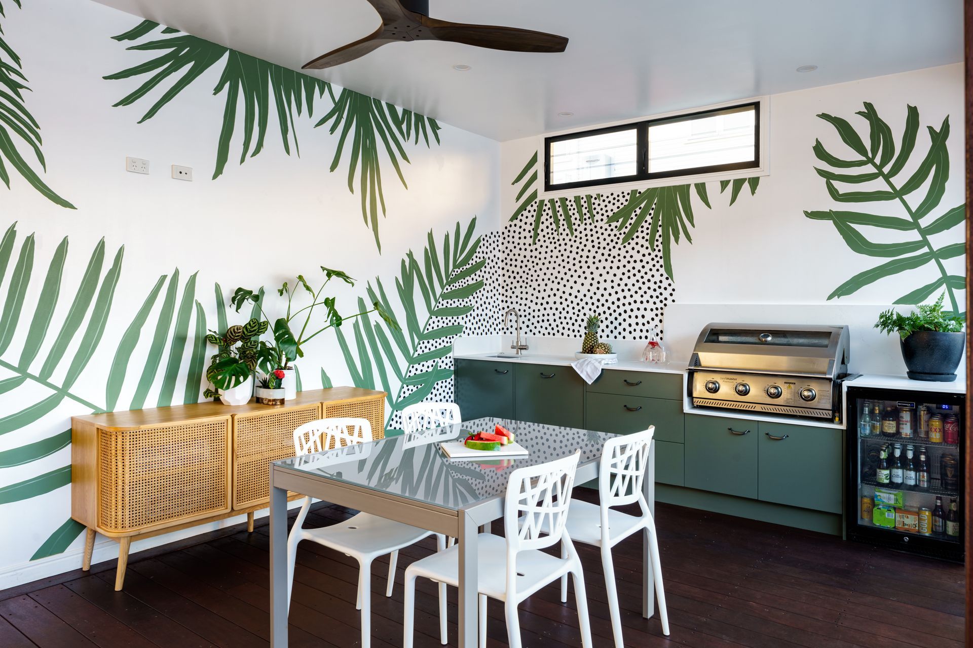 An outdoor sink, like the one featured in this exquisite Tarragindi outdoor kitchen, makes food preparation, cooking and cleaning so much easier