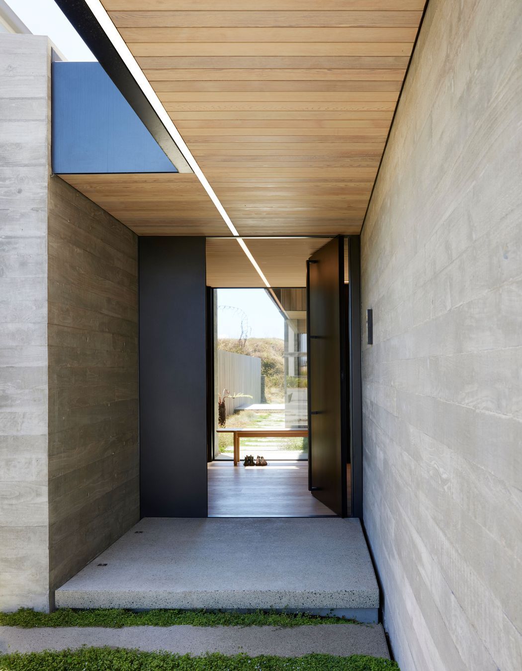 The entrance from the street side utilises the concept of solid and void, and the lighting leads the eye through. “We decided to have a sense of arrival so that’s why it’s a full-height pivoted door,” says Brendon.