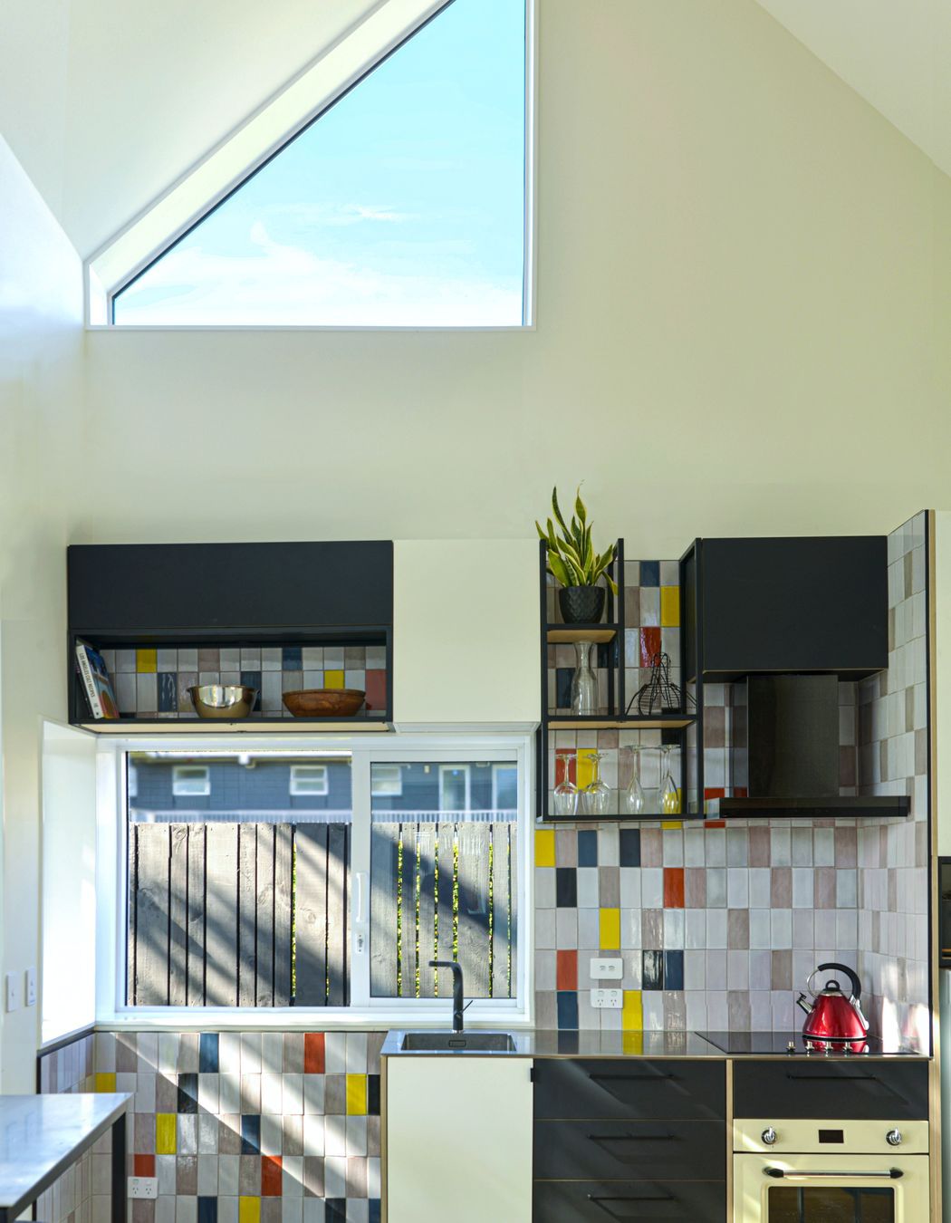 The double height living space feels generous in spite of its small footprint.