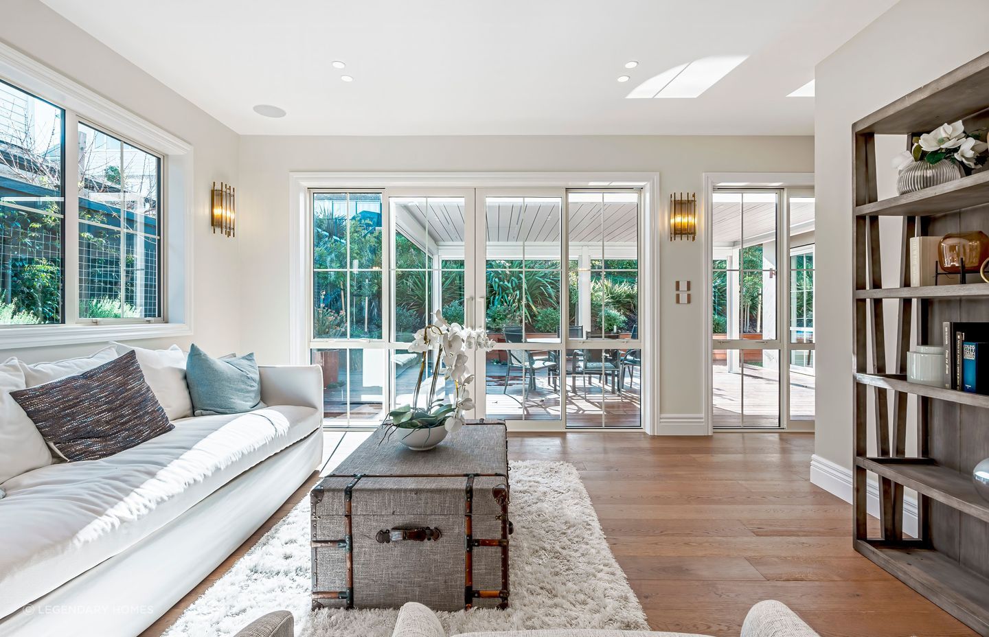 The light-filled living area opens out onto the patio.