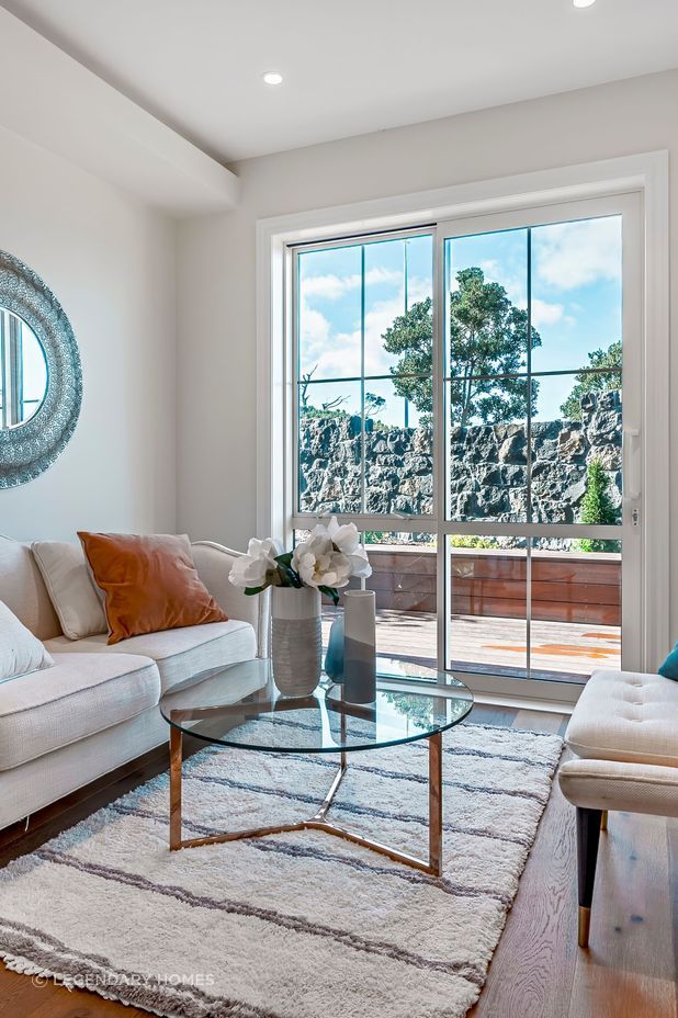 The unit has a living area and two bedrooms.