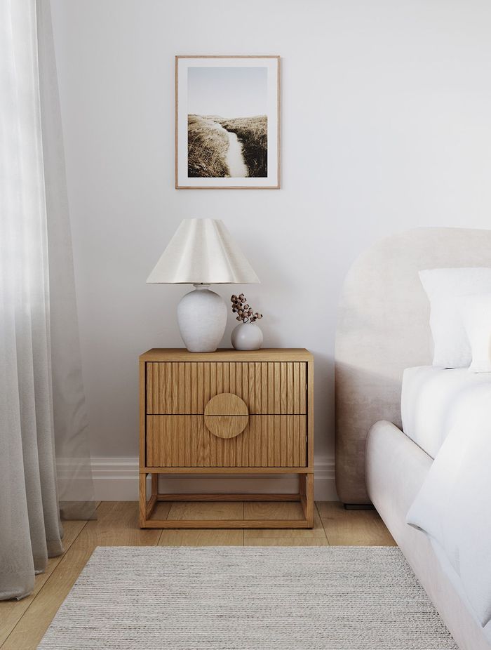 Braxton Ripple Slatted bedside table in natural oak.