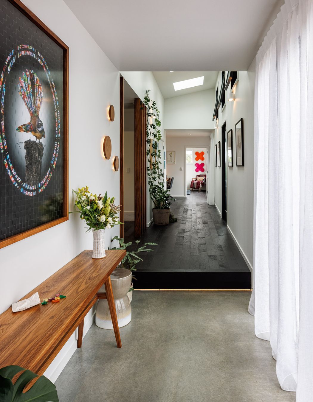 A spacious hallway doubles as a gallery.