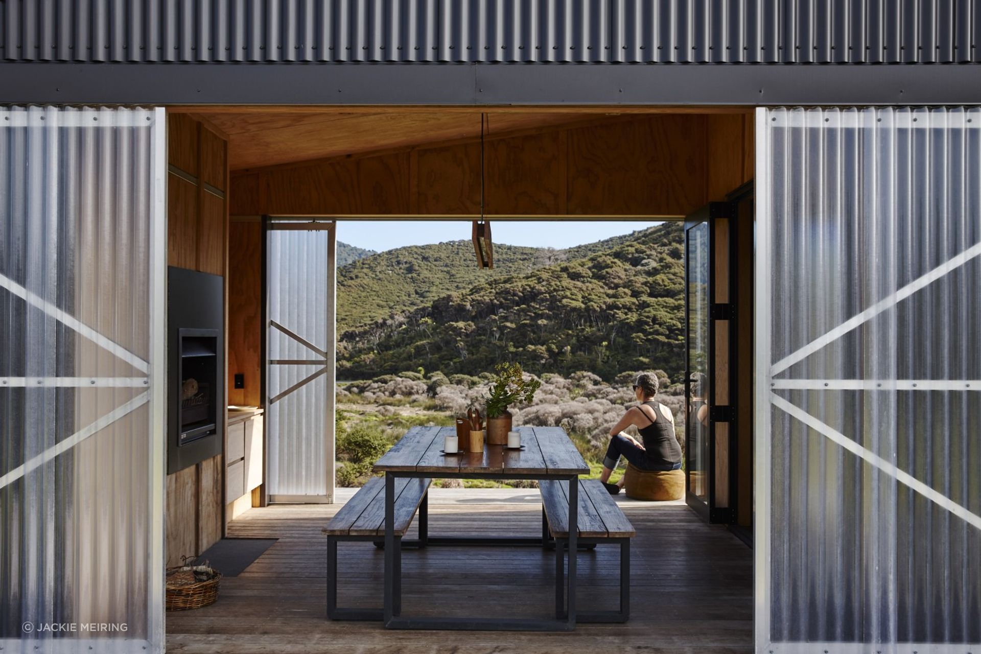 Two sets of translucent sliding screens on either side of the deck can open or close as desired.