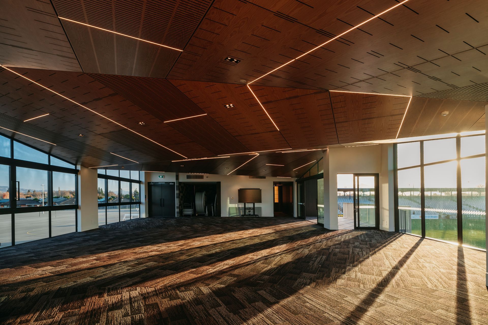 Upstairs, an open-plan space with extensive glazing provides a great viewing spot for netball and rugby games, with an adjacent boardroom for smaller meetings.
