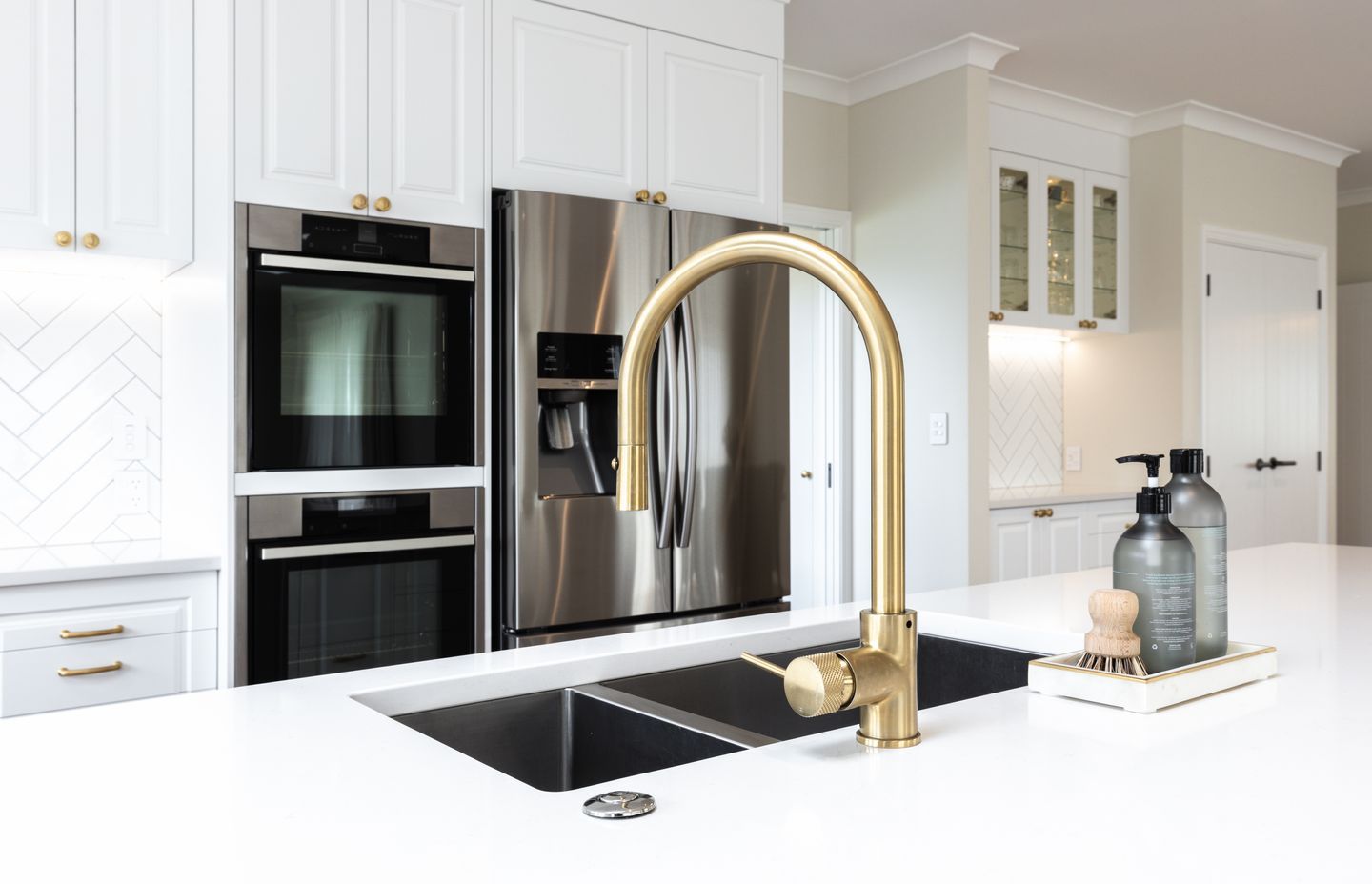 Brass hardware features throughout.