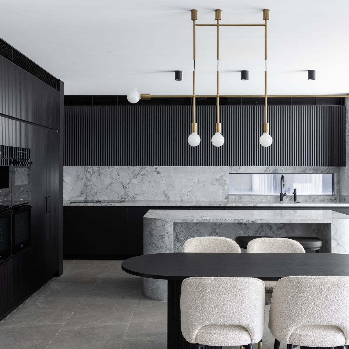 Sleek and moody: take a look inside this young family’s Sydney home