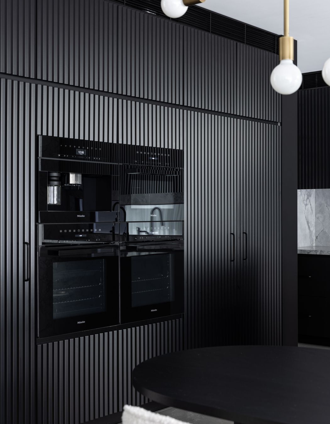 The cabinetry adds texture to the space.