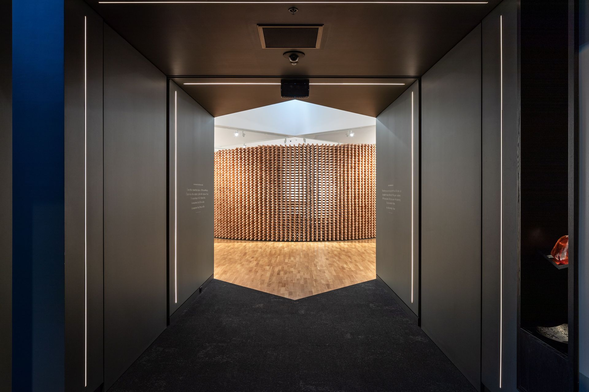 The museum transitioning into the memorial section of the building - from dark to light.