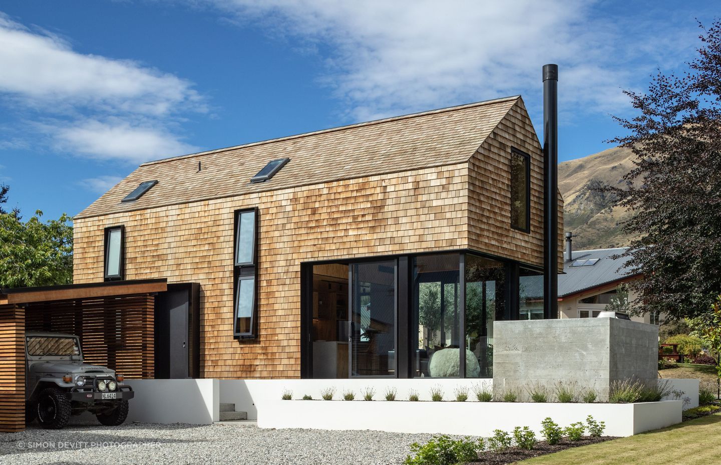 The cedar-shingled tiny house was built on a family-owned section in Wanaka, says Barry Condon of Condon Scott Architects. “The brief was for something that was compact that utilised the space as densely as possible. So I think we delivered on that front.”