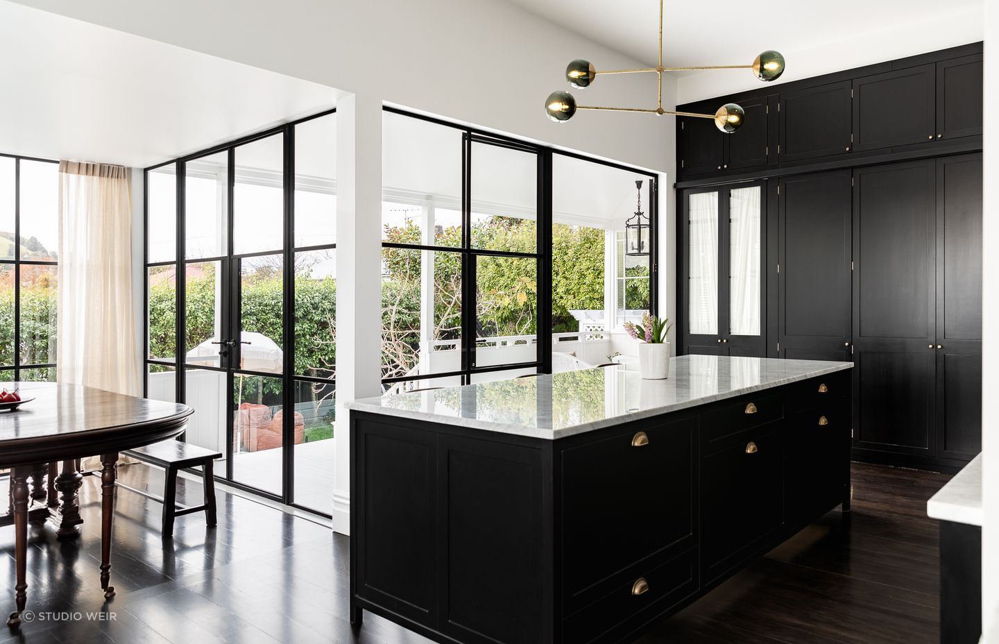 "I really wanted a big island where the children can spread out because we do lots of art, lego creations and entertaining," says Rebecca.