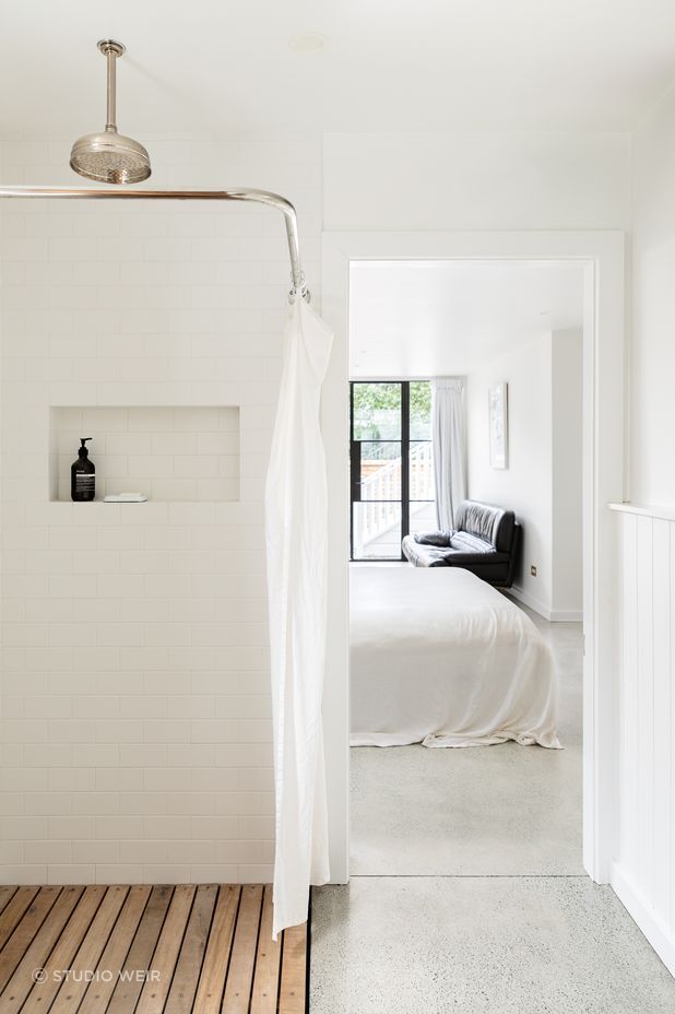 Construction included clearing under the house to create a guest bedroom, ensuite and laundry.