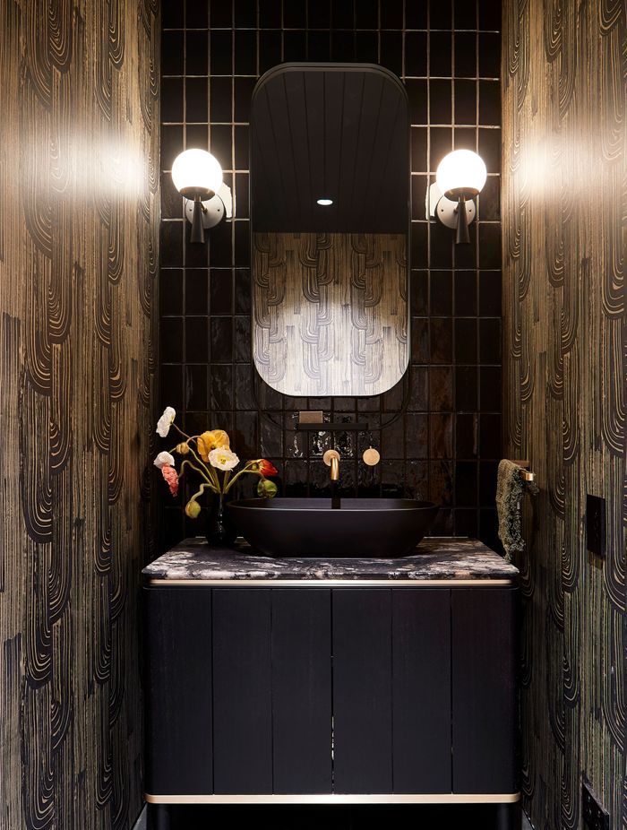 Beautiful mirror helps define the lighting | Photography by Shannon McGrath