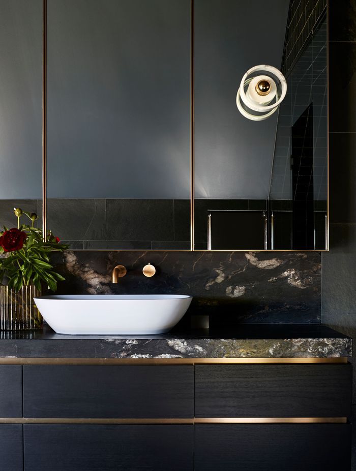 The gold accents the black and white colour scheme | Photography by Shannon McGrath