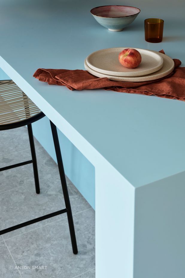 The huge blue Marblo kitchen island is perfect for hosting all the staff.