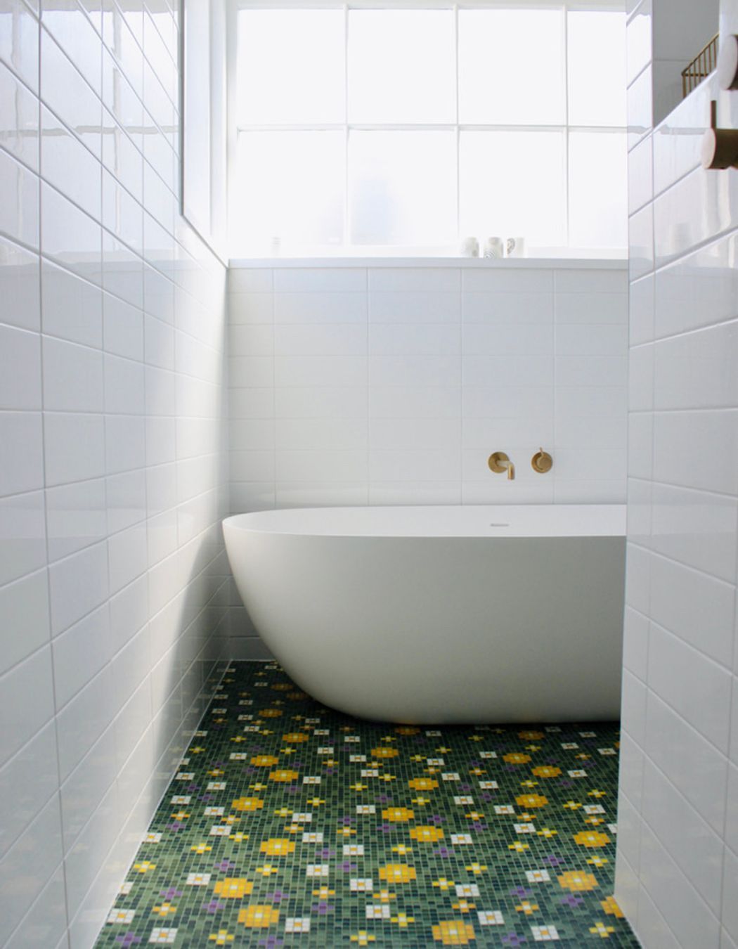 The family bathroom renovation by Ben Gommers at Gommers Construction. The Bisazza tiles are glass and needed a specialist tiler to work with the epoxy resin grout. “It’s quite an art,” says Ben.