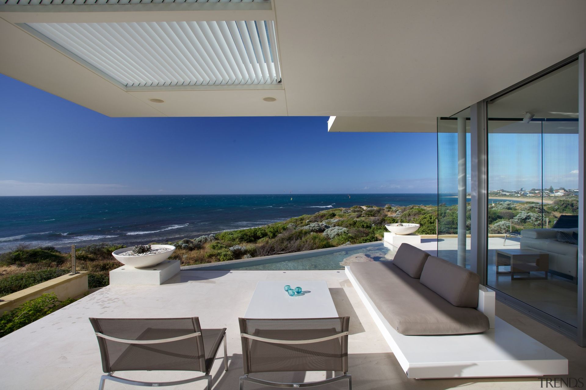 The stunning view can be enjoyed from the comfort of an outdoor lounger or the pool. Photography: Annetta Ashman.