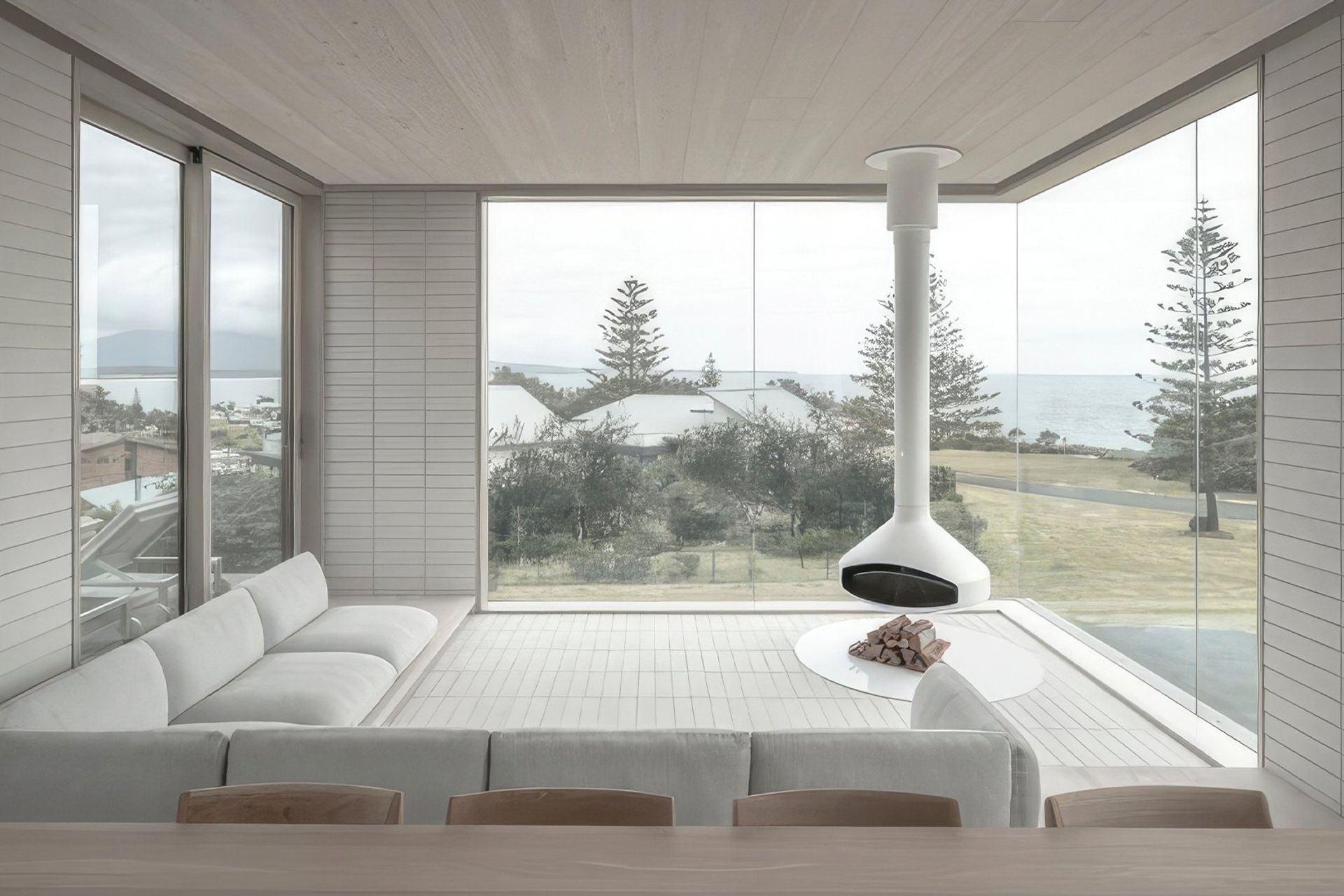 Interiors feature a carefully curated palette of white surfaces, soft sand, timbers and robust brickwork.