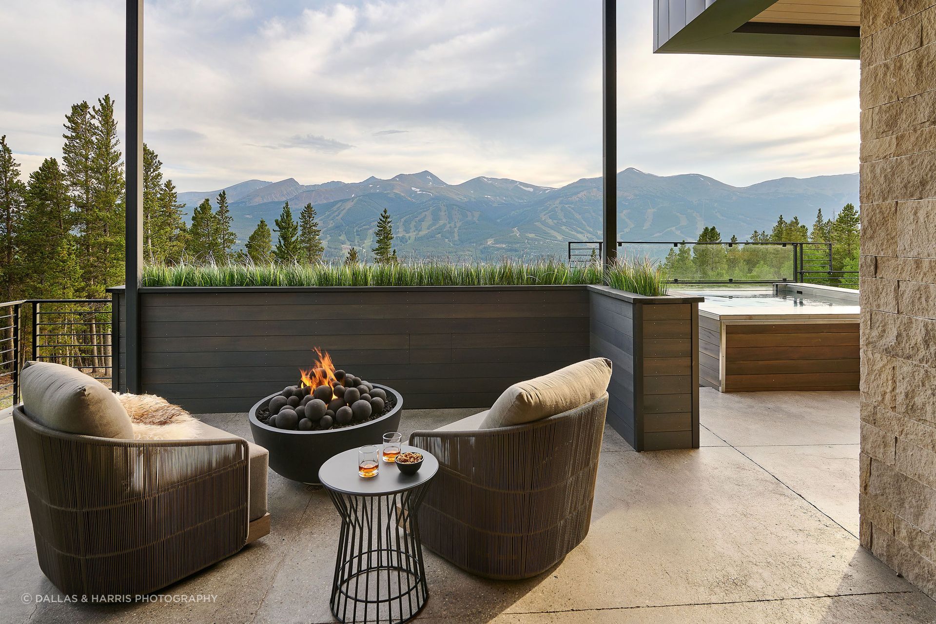 An intimate sitting area off the primary suite at KA DesignWorks' project in Breckenridge, Colorado, offers privacy without sacrificing a breathtaking vista beyond.