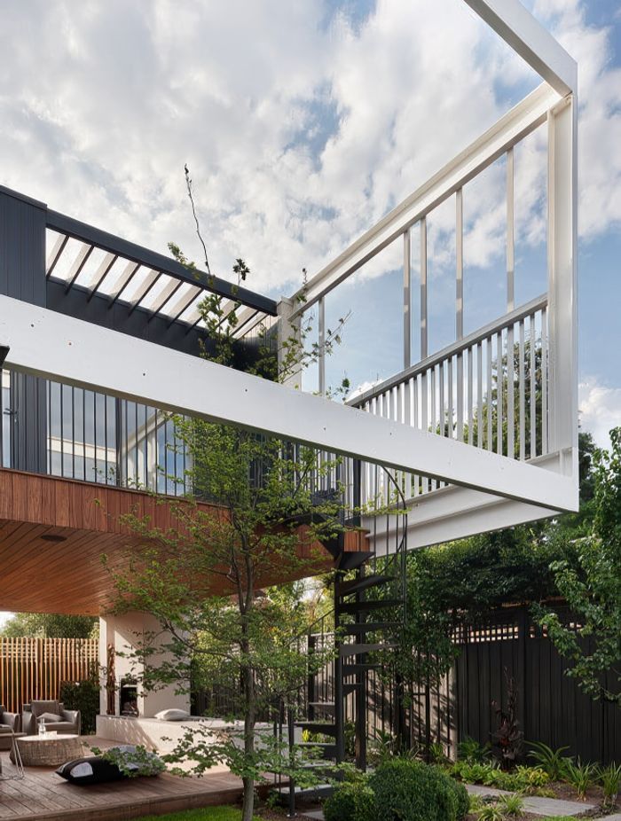 Stepping House features a secret side entry and a romantic spiral stair to take young adults to their retreat which includes bedrooms with ensuites, a rumpus that is now young adults lounge and a balcony of their own.