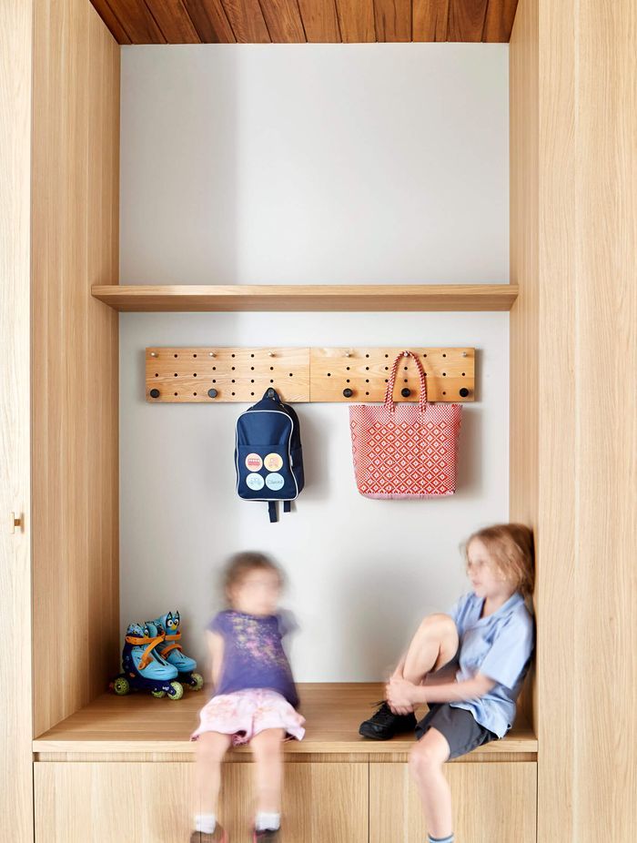 The mud room at the Long Garden House has storage for bags, shoes, sports gear and coats.