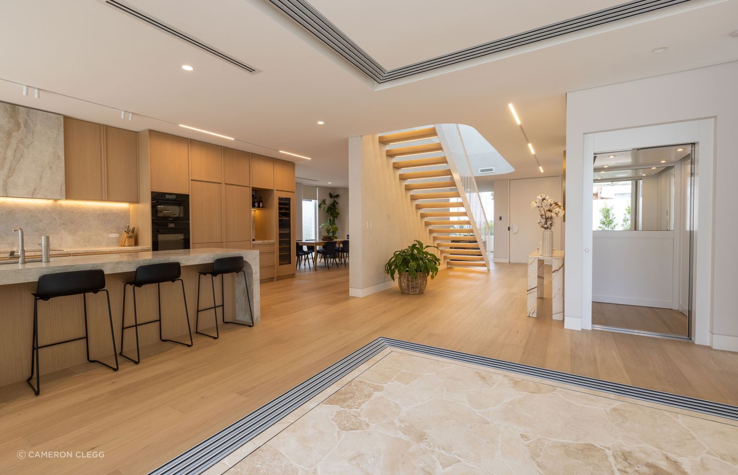 A lift connects the three levels of the home.