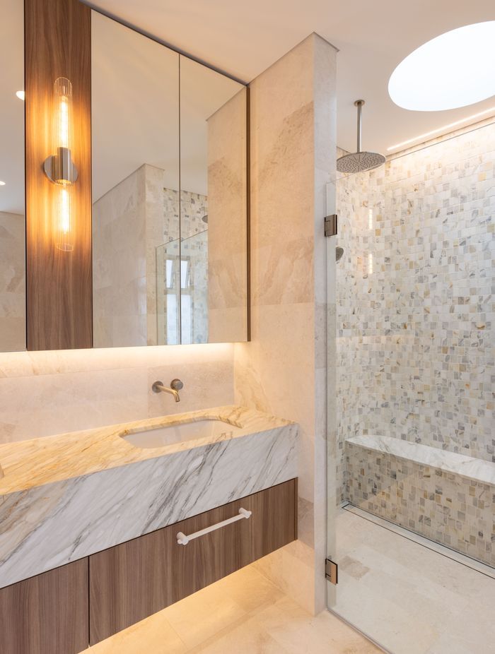 Natural tones, textures and shapes continue throughout this architectural home.