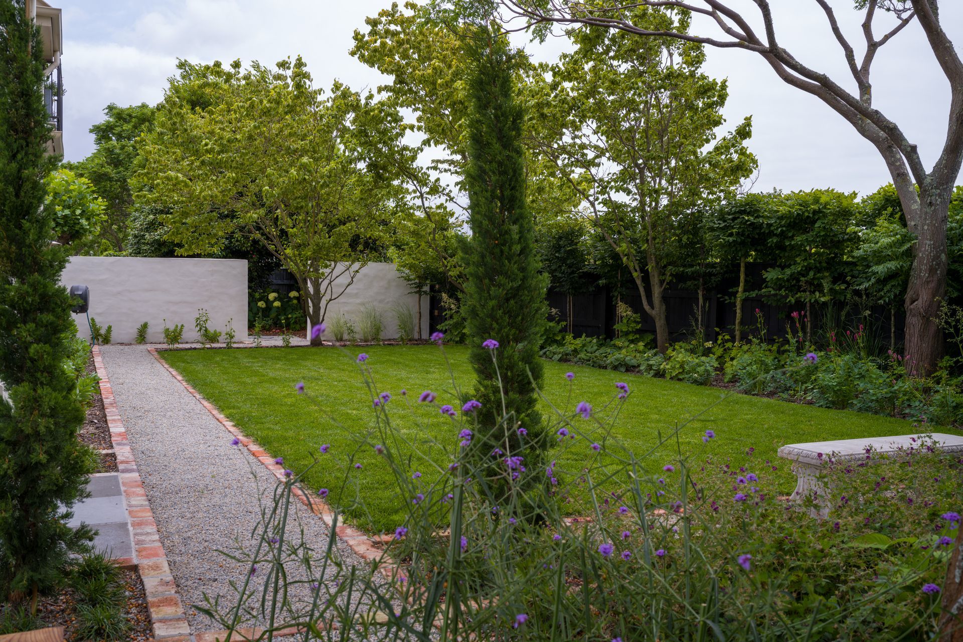 The landscaping was intrinsically tied to the architectural design of the home's renovation.