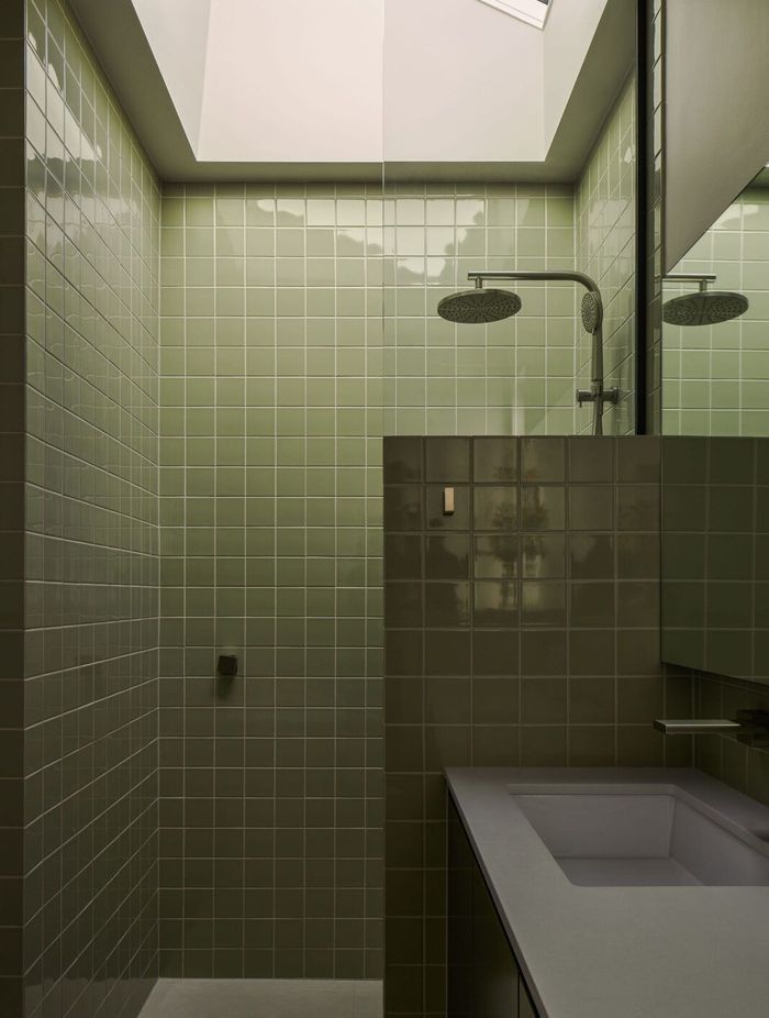 In the master suite, a collection of high windows and skylights allow the northern light to shine through.