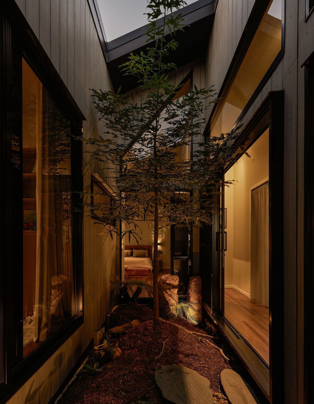The home is called 'Middle Habitat'. Fittingly, it has a tranquil central atrium.