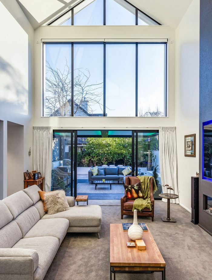 Plenty of natural light enters the main living area through the extensive glazing.