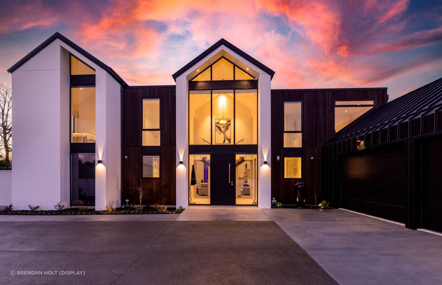 Guests are greeted by a grand entrance at this home on Regents Park Drive, designed by Choice Architecture.
