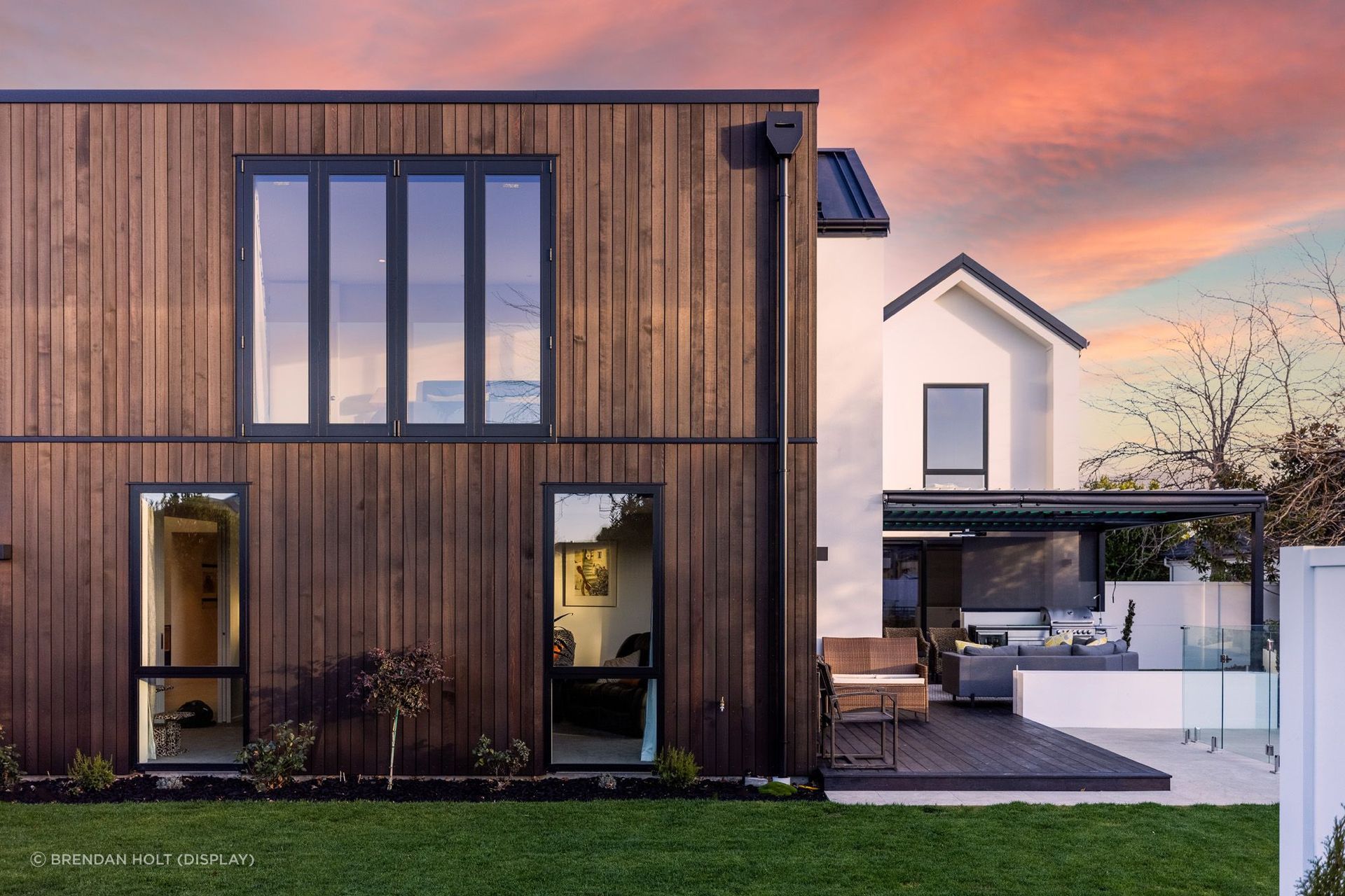 The exterior of the house is a contrast of colours and materials, including AAC panel, cedar and Colorsteel Eurotray.