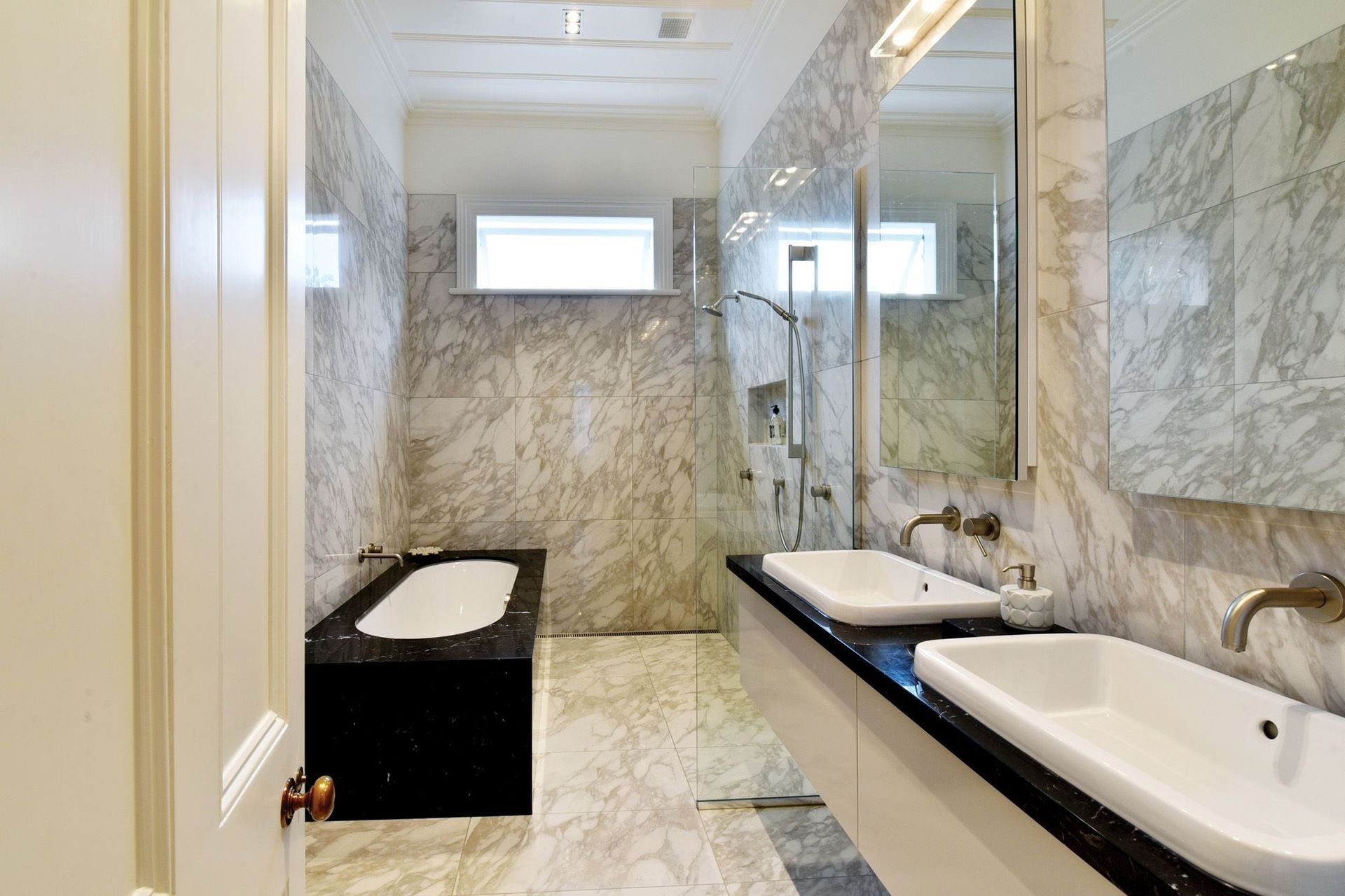 Marble finishes aplenty in the villa's luxurious bathroom.