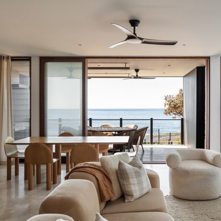 This striking modern home captures sweeping ocean views through an ingeniously compact layout